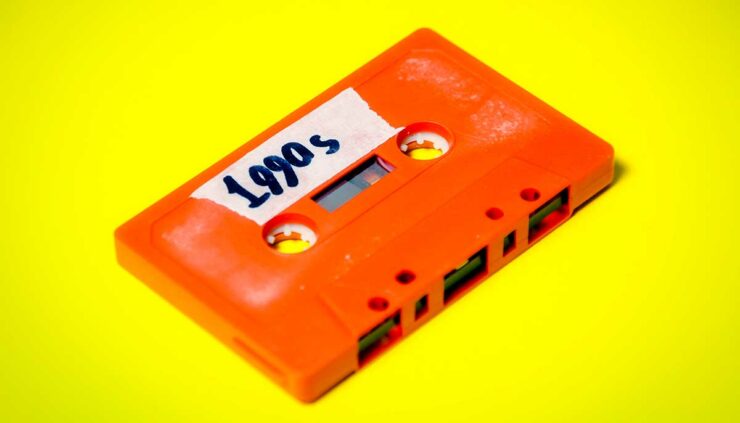orange cassette tape on a yellow background with a label that reads "1990s"