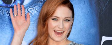 Sophie Turner smiles during the season seven premiere for Game of Thrones