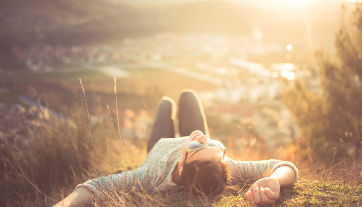 Woman laying in the grass