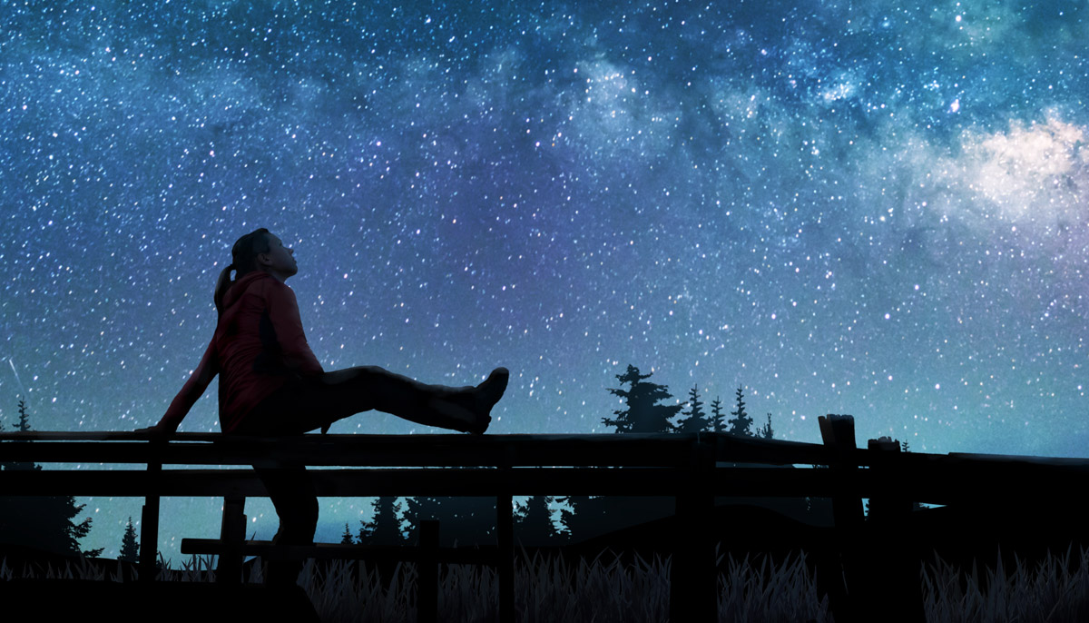 Silhouette of girl looking at stars