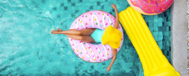 Woman floating in pool