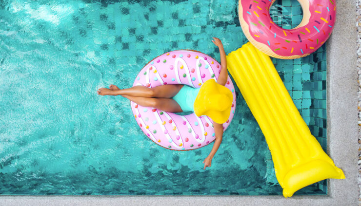 Woman floating in pool