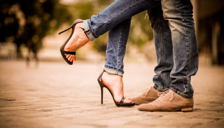 Shot of a romantic couple's feet