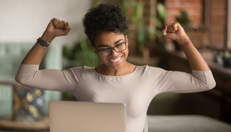 Woman celebrates success at work