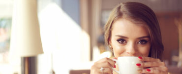 Woman sipping coffee