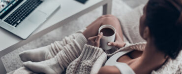 Woman cozy on couch