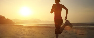 Woman running on beach