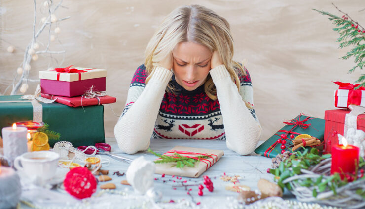stressed out woman during Christmas gift prep