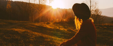 Woman in a field in autumn