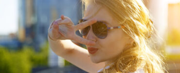 Blond girl in sunglasses