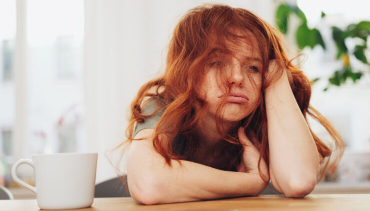 Frustrated red-headed woman